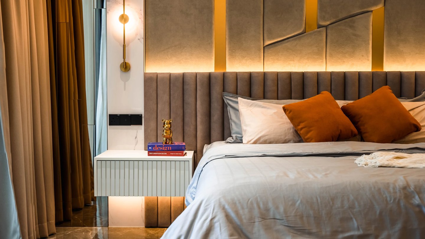 Bedroom lighting ideas — wall-mounted bedside sconce and concealed cove lighting in a Cyberjaya master bedroom, Setia Marina One