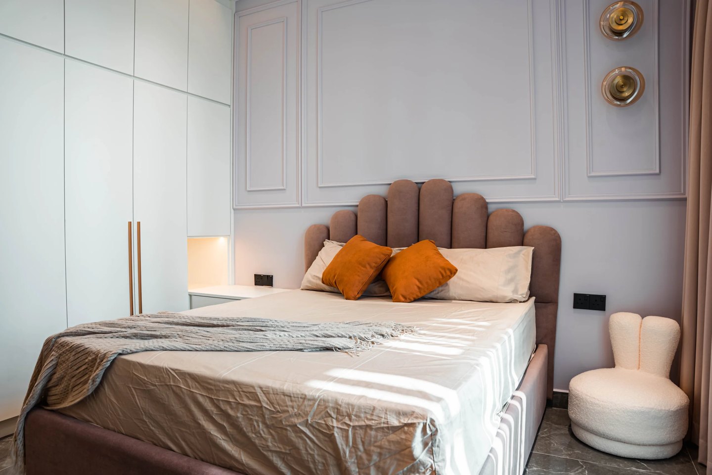 Bedroom colour palette ideas — blush panelling and a scalloped headboard with light furniture, Setia Marina One, Cyberjaya
