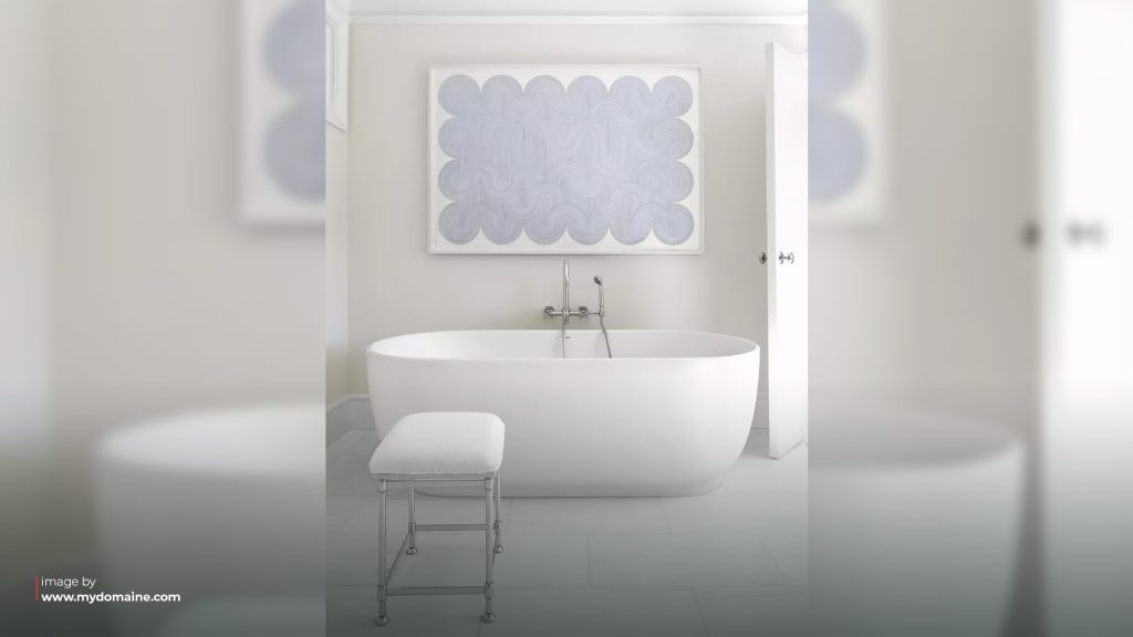 bathtub with wall art