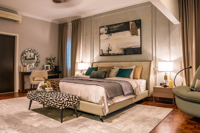 Bukit Tunku Residence, Kuala Lumpur: master bedroom with a panelled feature wall and abstract art