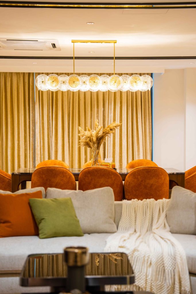 Warm family living room in a luxury Bangsar bungalow by Blaine Robert Design