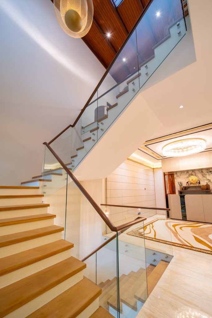 Double-height staircase in a luxury Bangsar bungalow by Blaine Robert Design