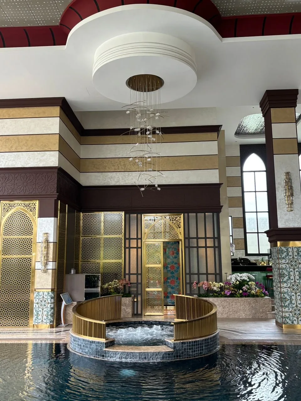 Domed plaster ceiling with a ceiling rose over the indoor pool at The Peak, Ampang