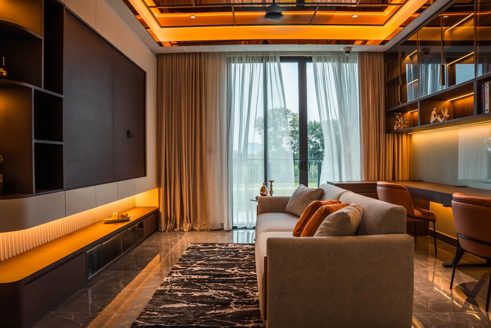 Lit tray ceiling over a family lounge with timber joinery at Setia Marina One