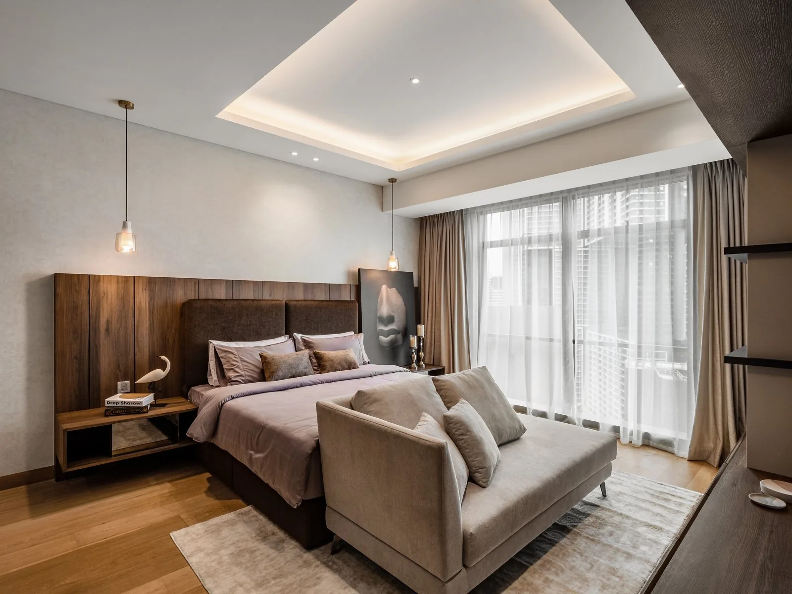 Tray ceiling with cove lighting over the bedroom at The Ritz-Carlton Residences, Kuala Lumpur