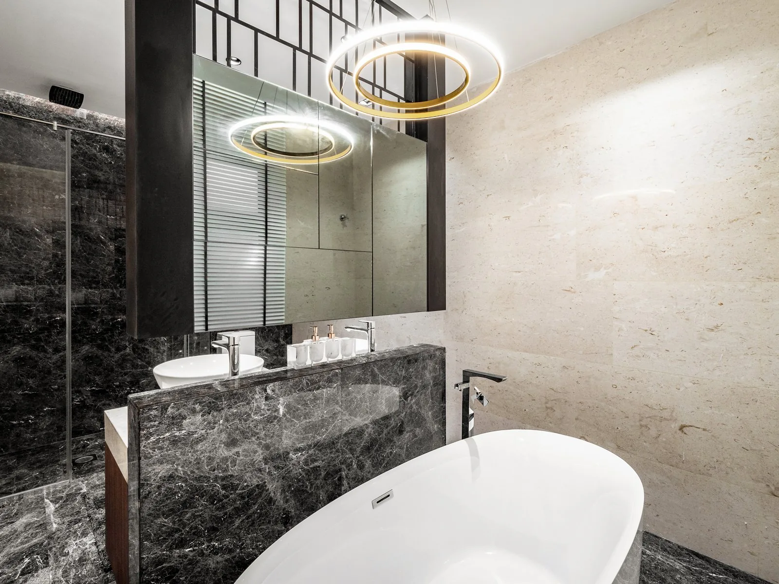 Bathroom ceiling with ring pendants over a freestanding bath in the Terengganu bungalow
