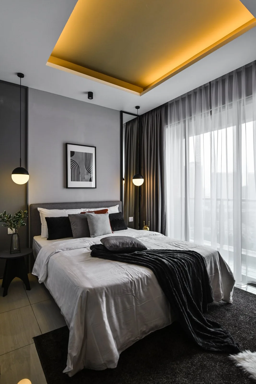 Gold cove ceiling over a condo bedroom at Dorsett Hartamas
