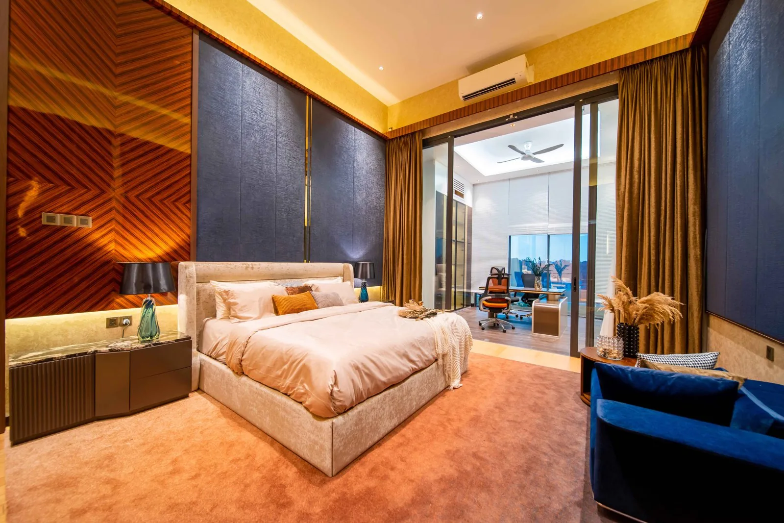 Master bedroom with a lit cove ceiling and panelled walls in the Bangsar bungalow