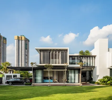 Double storey house design in Malaysia: the garden front of our completed Kelana Jaya Villa, Petaling Jaya, a modern two-storey house by Blaine Robert Design