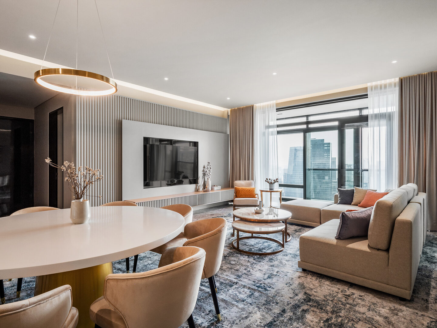 Living and dining area of a three-room luxury apartment at Four Seasons Place Kuala Lumpur by Blaine Robert Design