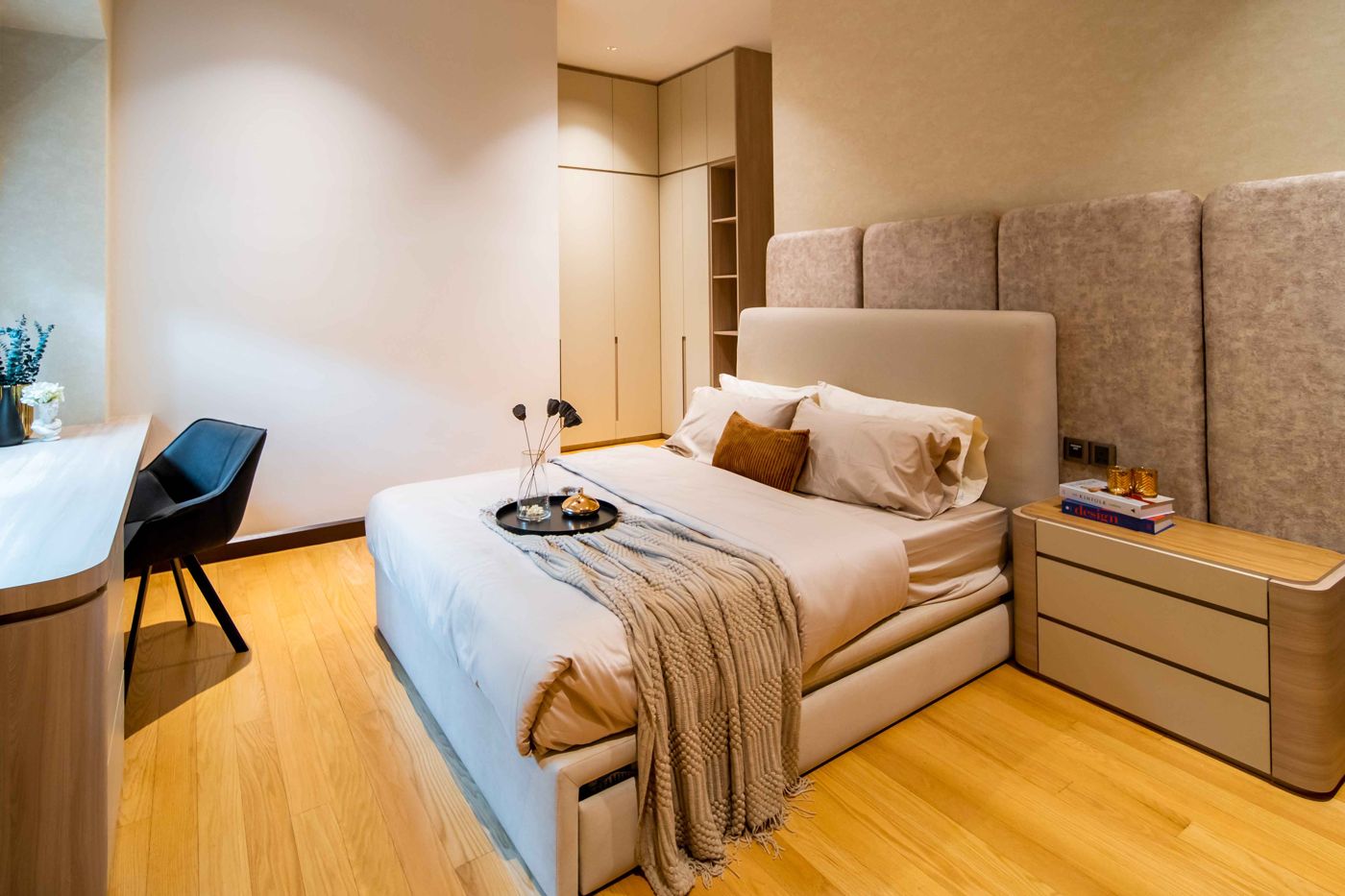 Guest bedroom with timber flooring in a Bangsar bungalow