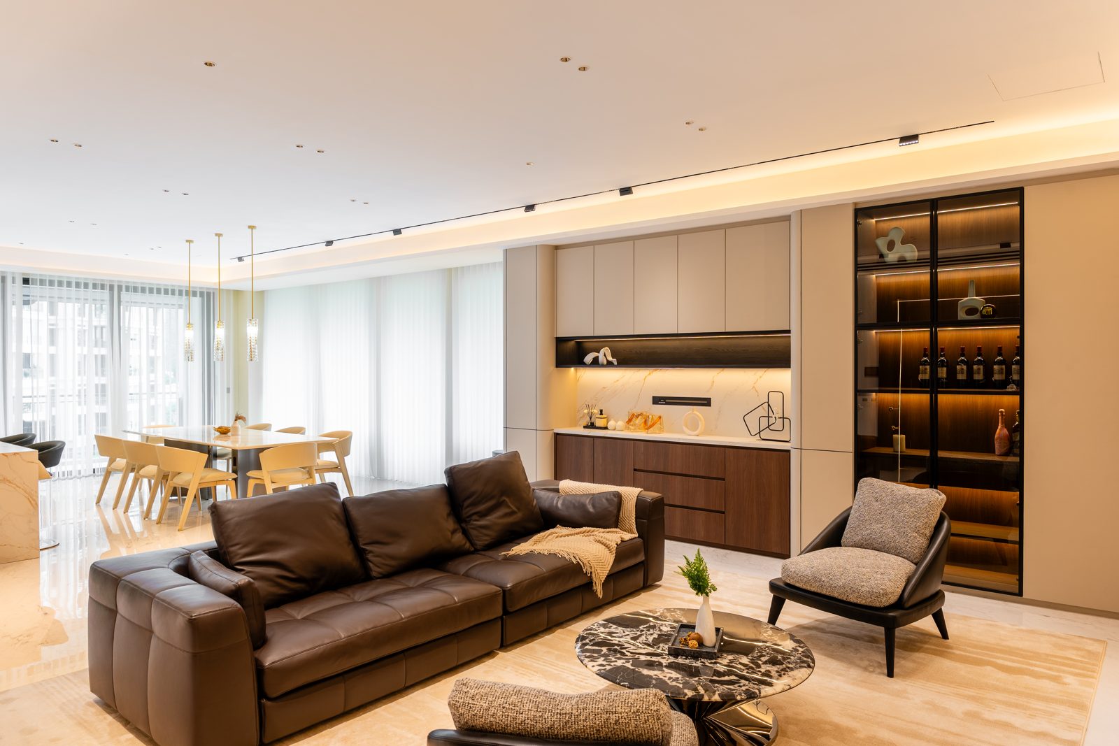 Living and dining interior of a Kuala Lumpur condominium by Blaine Robert Design
