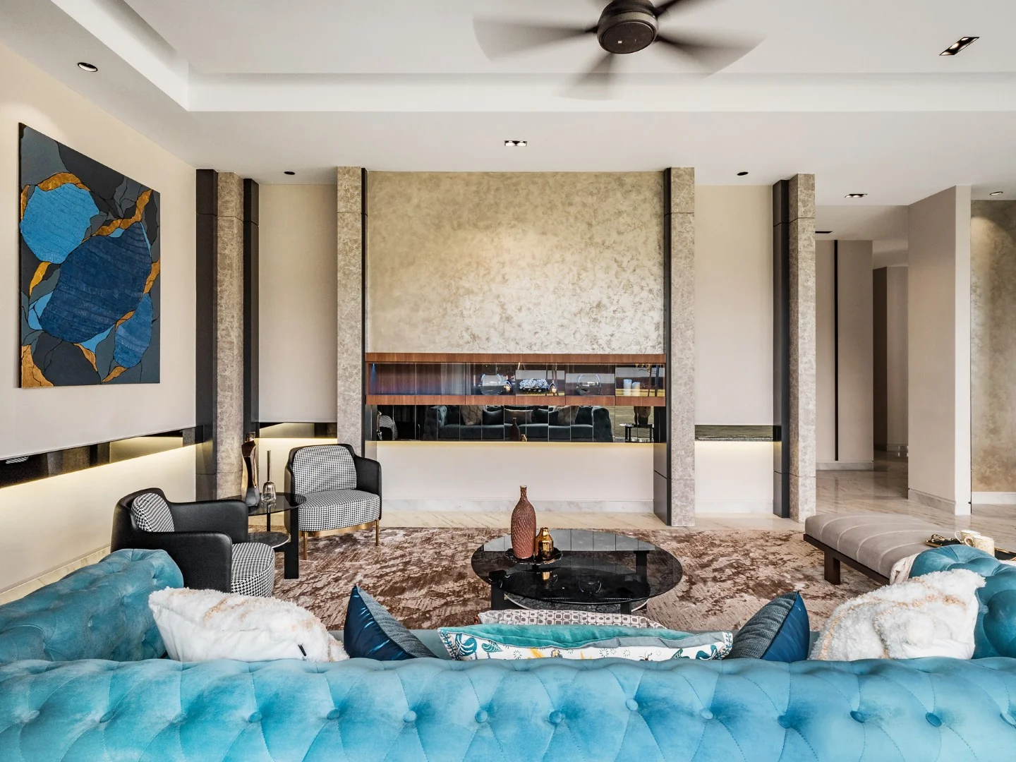 Family living room designed around daily use, with teal sofa, TV wall and dining area beyond, Kelana Jaya bungalow