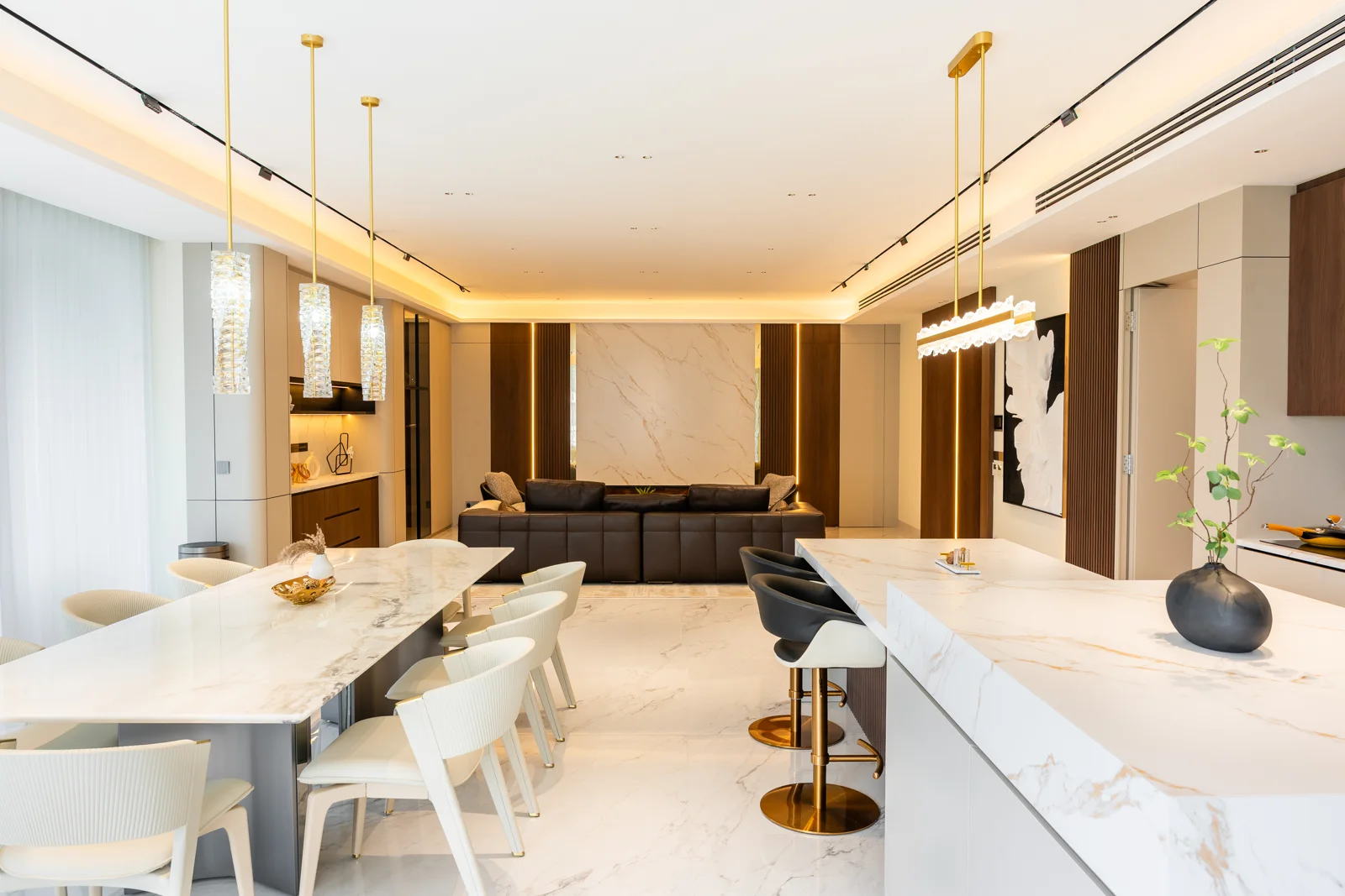 Open floor plan with a marble kitchen island at Park Regent, Desa ParkCity
