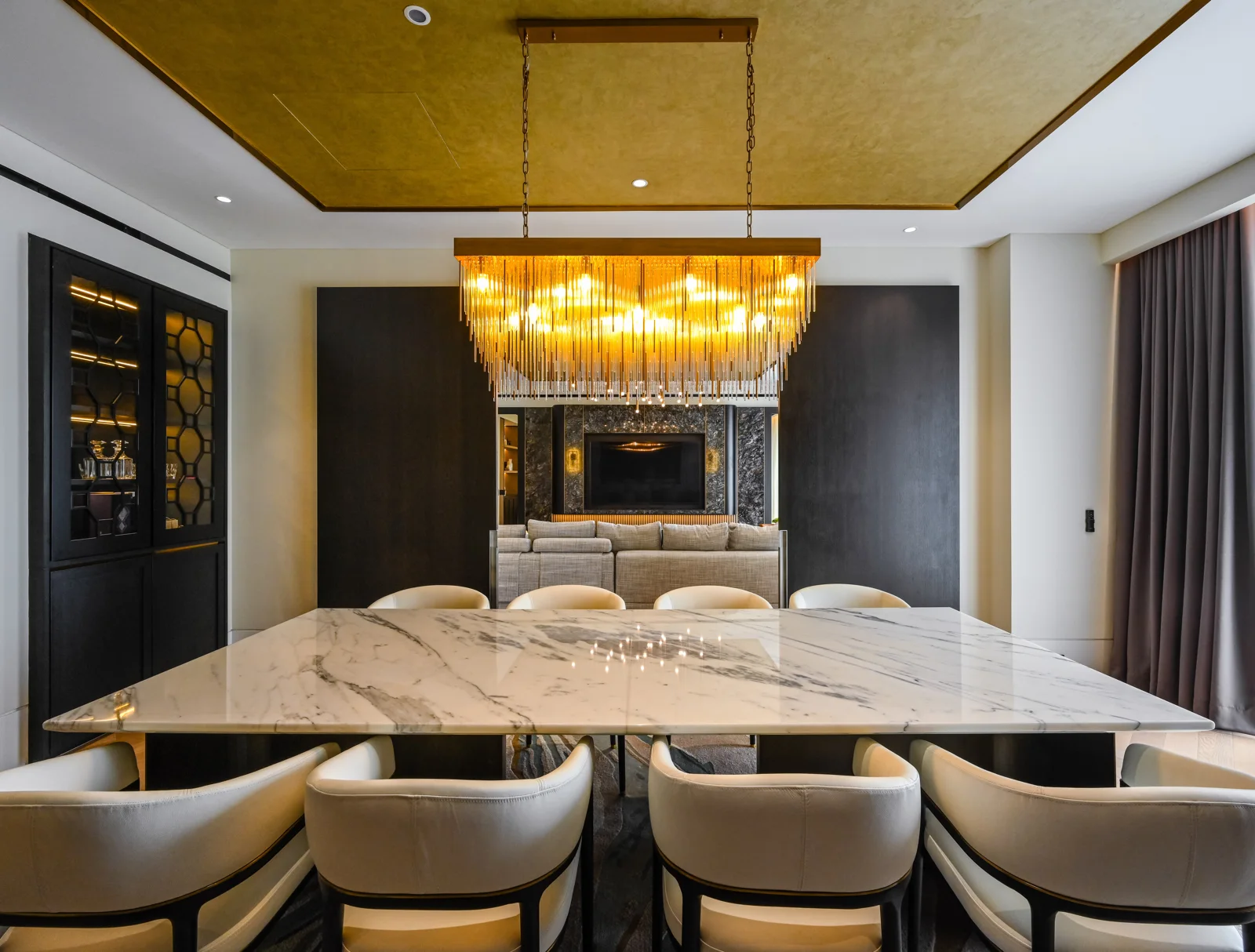 Statement lighting over the dining table at Aira Residence, Damansara Heights