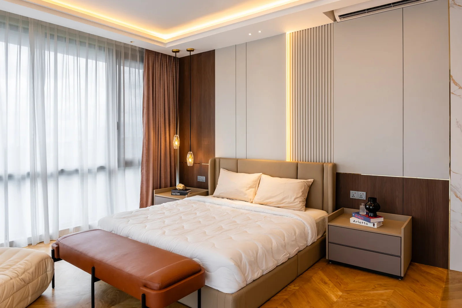 Neutral-palette bedroom with concealed lighting at Park Regent, Desa ParkCity