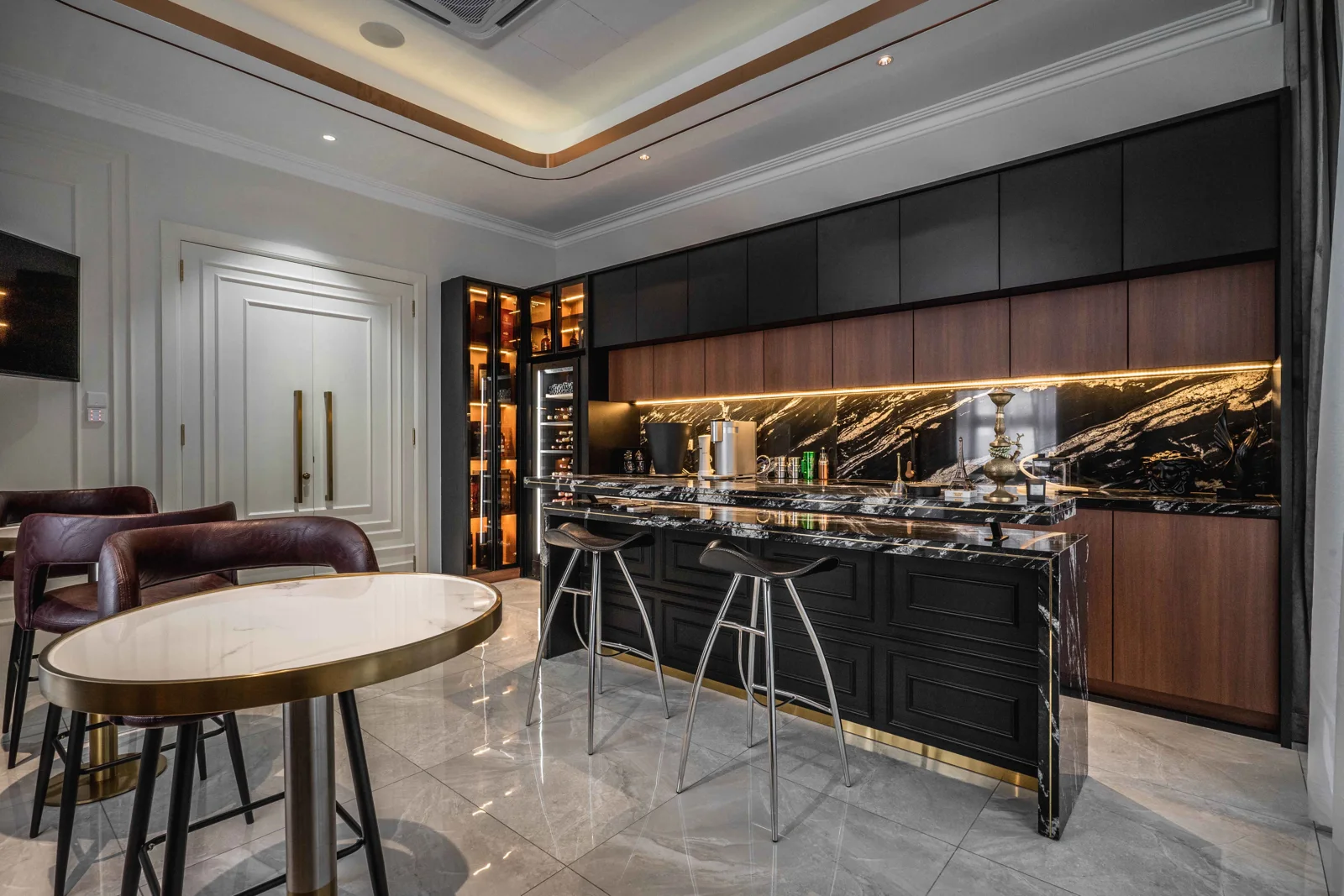 Black joinery bar with a marble counter in a landed home at Eco Spring, Johor