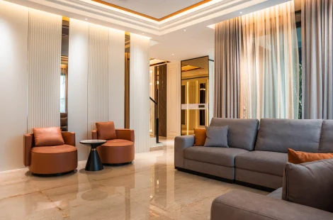 Condominium interior design in Cyberjaya — living room with fluted panelling at Setia Marina One by Blaine Robert Design