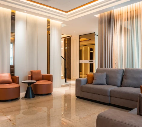 Landed home interior design in Cyberjaya — living room with fluted panelling at Setia Marina One by Blaine Robert Design