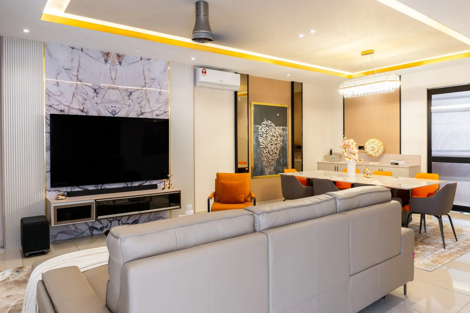 Terrace house living room with a marble television wall and layered lighting, Serimba Residence, Kajang