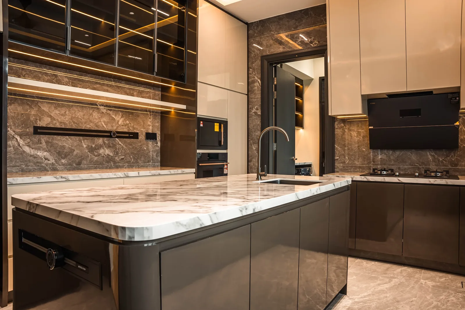 Dry kitchen with a glass door to the wet kitchen in a landed home at Setia Marina One, Cyberjaya
