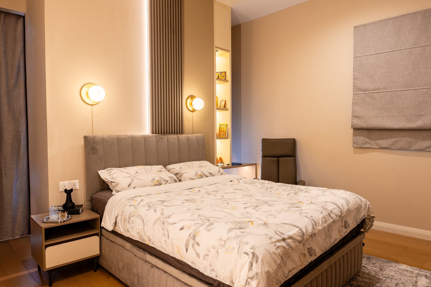 Slatted timber accent wall behind the bed with cove lighting at TRX Residence, Kuala Lumpur