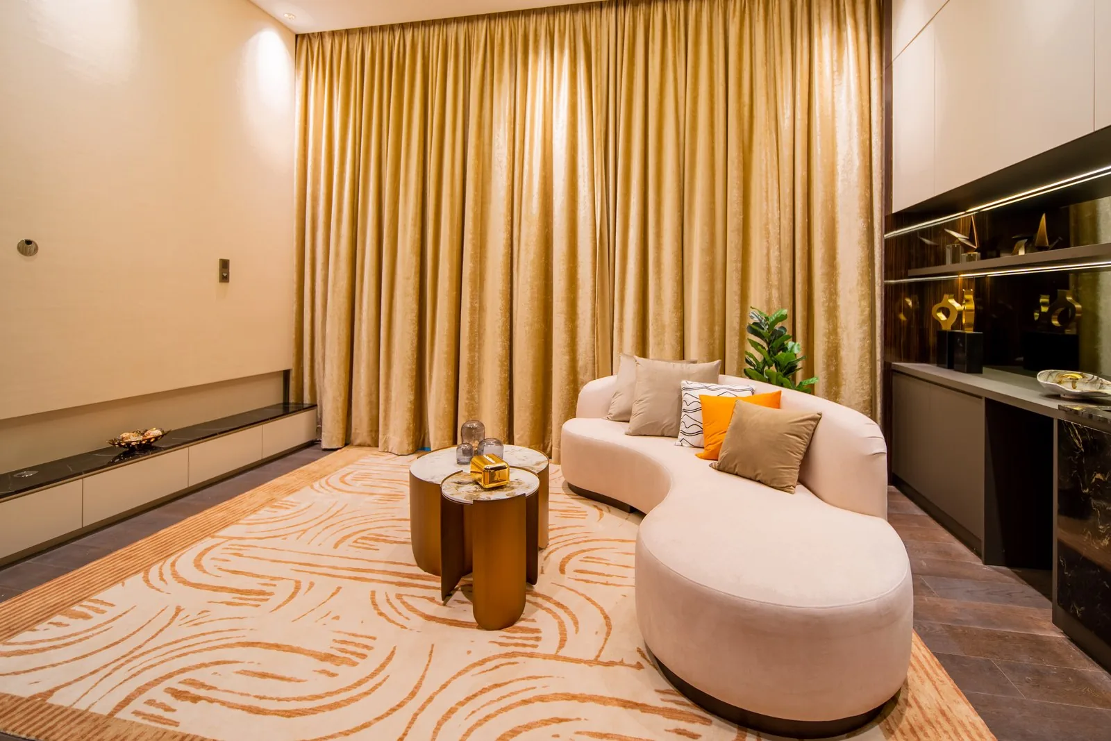 Low floating console along the wall of the upstairs lounge in a Bangsar bungalow