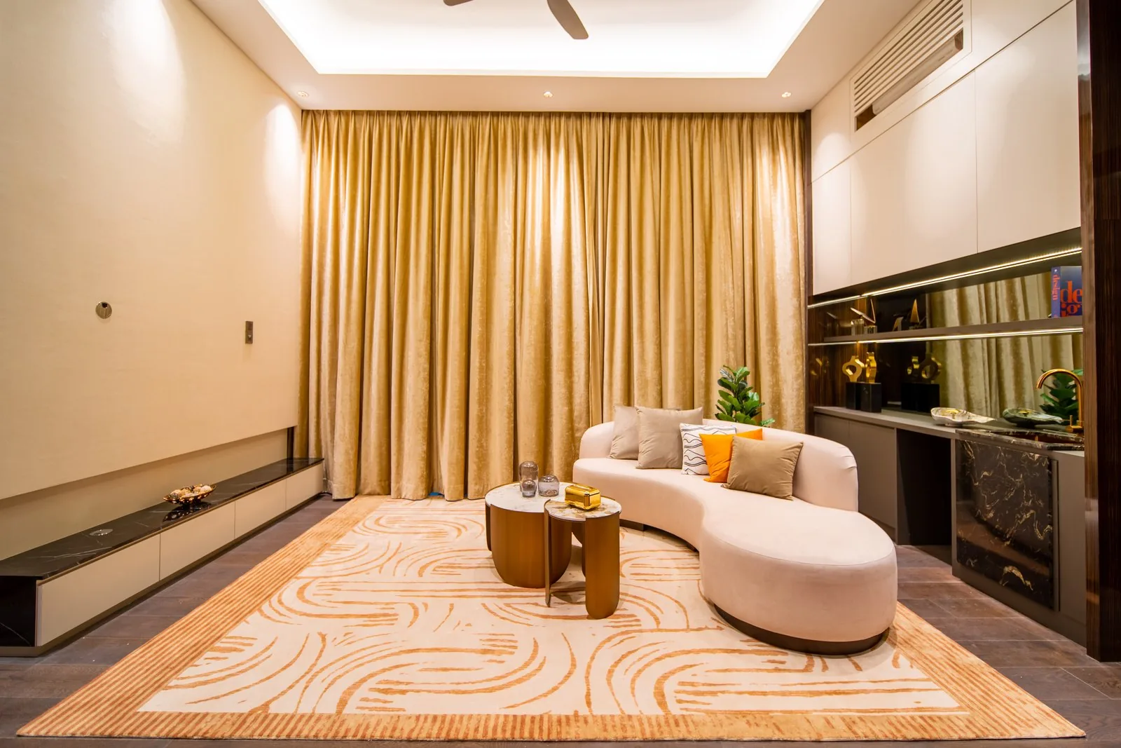 Floating console with display shelving in the upstairs lounge of a Bangsar bungalow