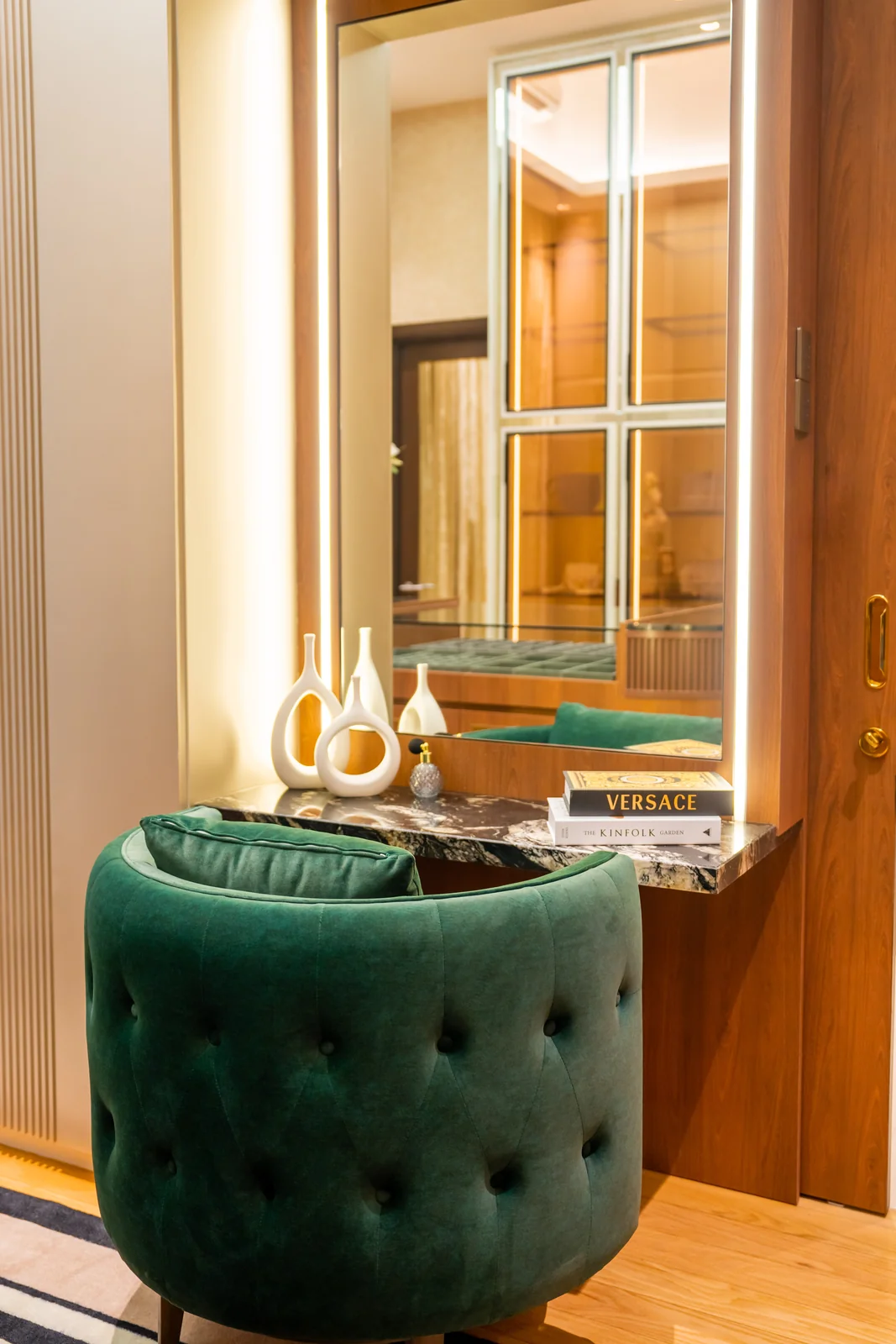 Vanity mirror with velvet stool in a dressing area, Bangsar bungalow by Blaine Robert Design